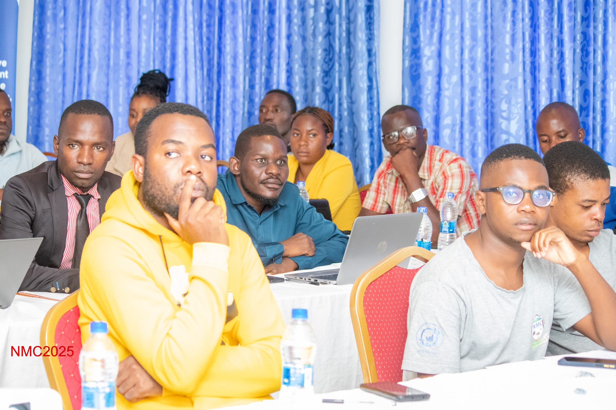 Journalists listening to presentations