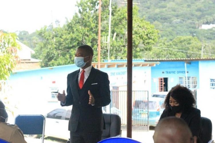 Legal Aid Bureau official makes a speech during the launch