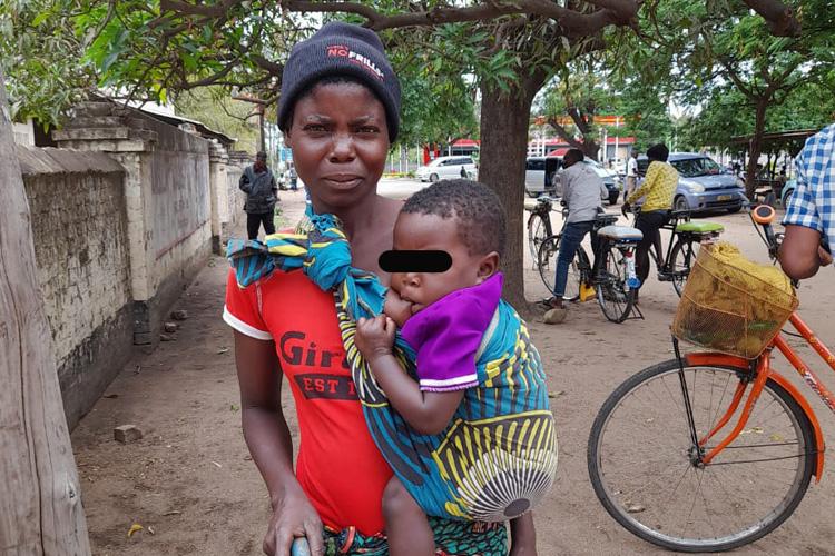 Patuma Afiya with child that is breastfeeding