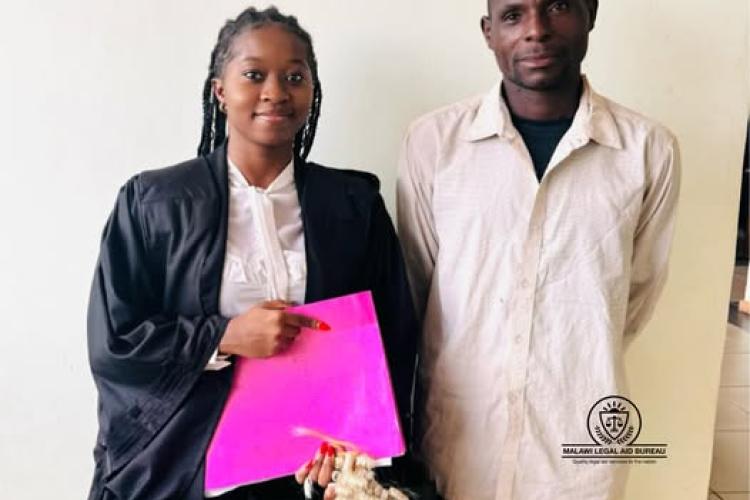 Counsel Mulwafu (left) with the client