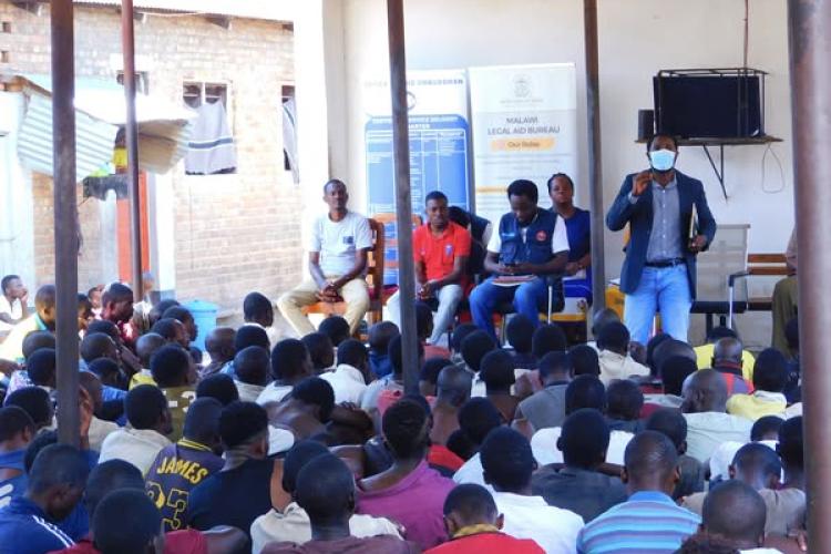 LAB officers addressing inmates in Nkhotakota